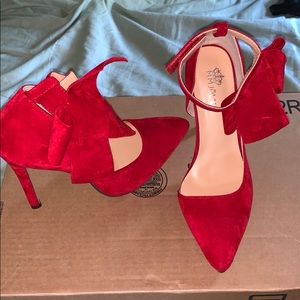 Red brand new heel with bow